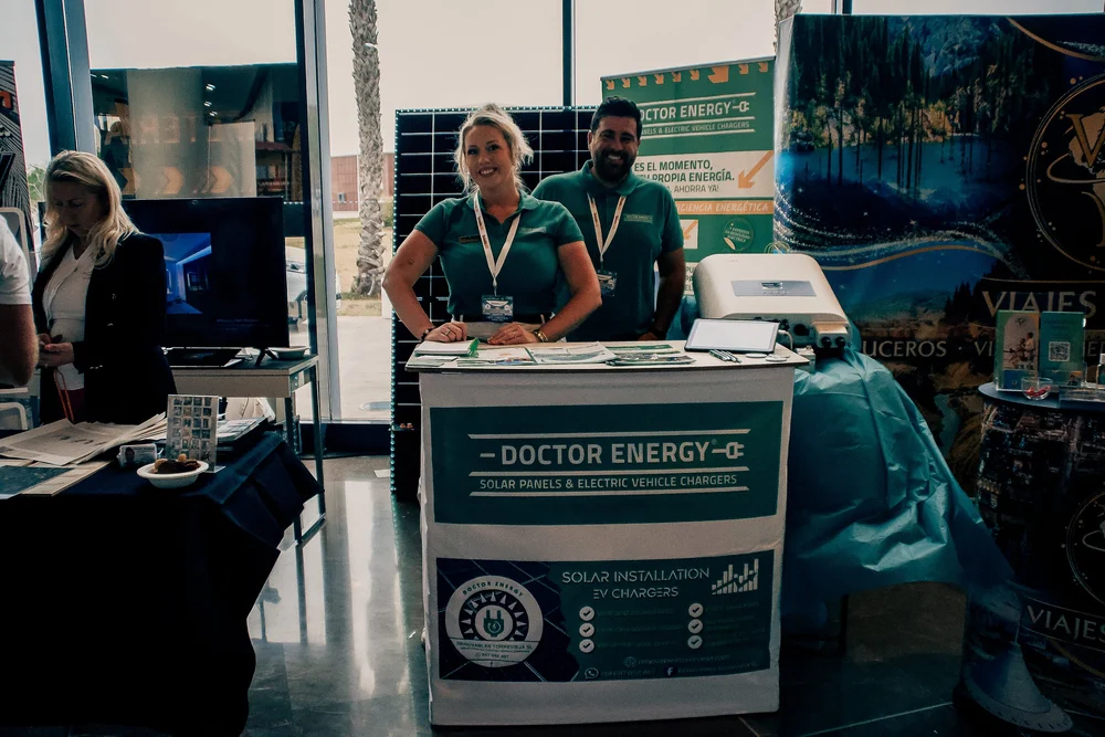 Doctor Energy team presenting solar energy panels and electric vehicle chargers