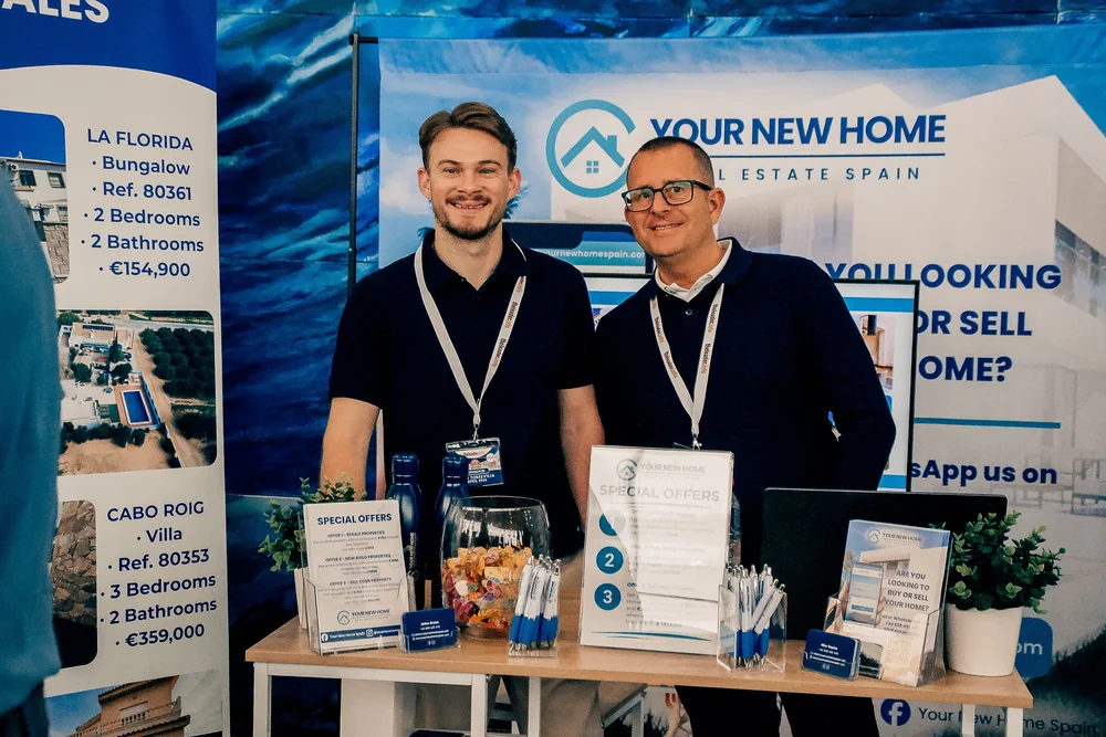 Your New Home Real Estate stand with special buyer and seller offers
