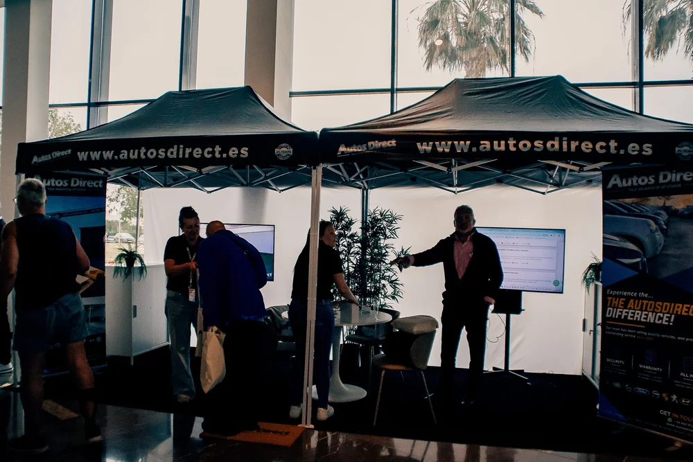 Autos Direct branded gazebo pavilion on the ground floor with automotive advisors