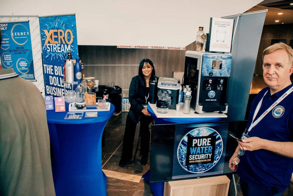 Xero Stream pure water generation machine on display with water sampling