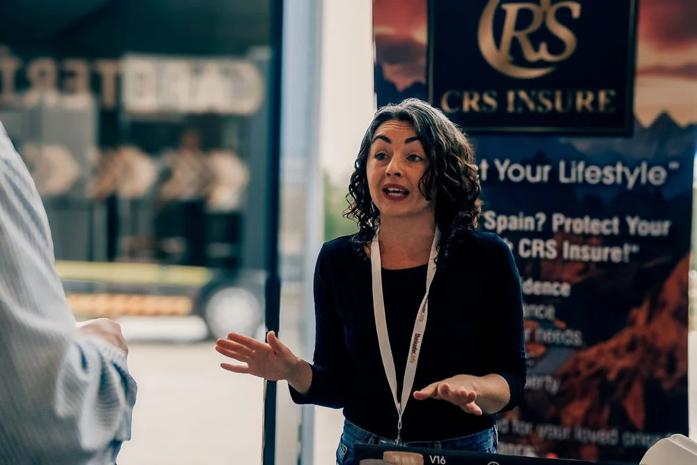 CRS Insure specialist reviewing tailored insurance options with clients